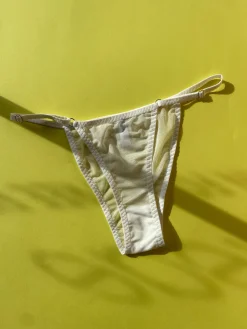 Kye Intimates: Daily Mesh Adjustable String Brief - Bone